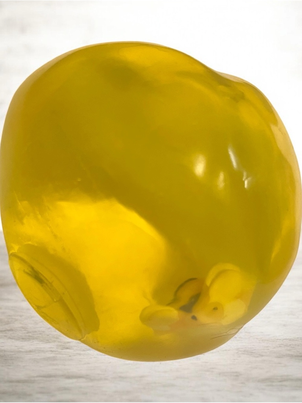 Yellow clear Coconut oil stress ball with bee charm